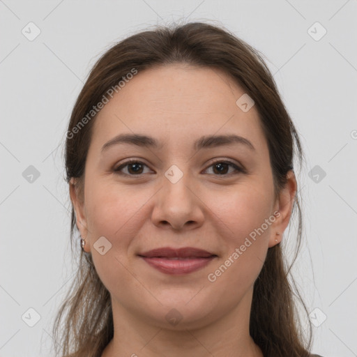 Joyful white young-adult female with medium  brown hair and brown eyes