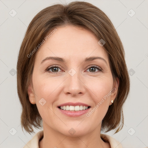 Joyful white young-adult female with medium  brown hair and grey eyes