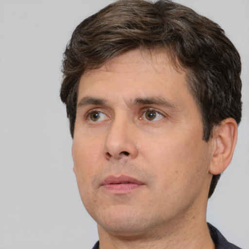 Neutral white adult male with short  brown hair and brown eyes