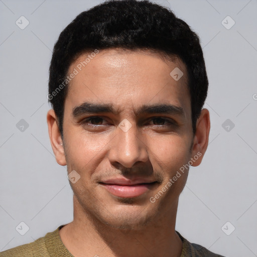 Joyful white young-adult male with short  black hair and brown eyes