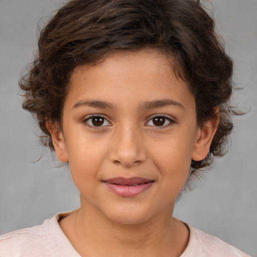 Joyful white child female with medium  brown hair and brown eyes