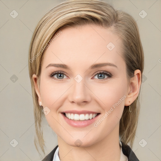 Joyful white young-adult female with medium  brown hair and blue eyes