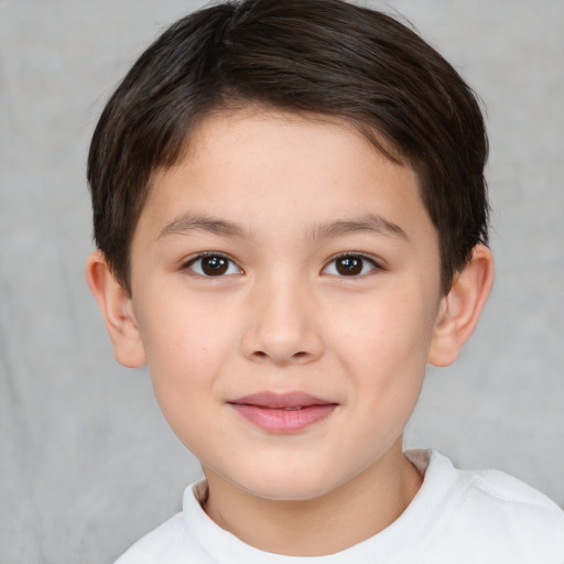 Joyful white child female with short  brown hair and brown eyes