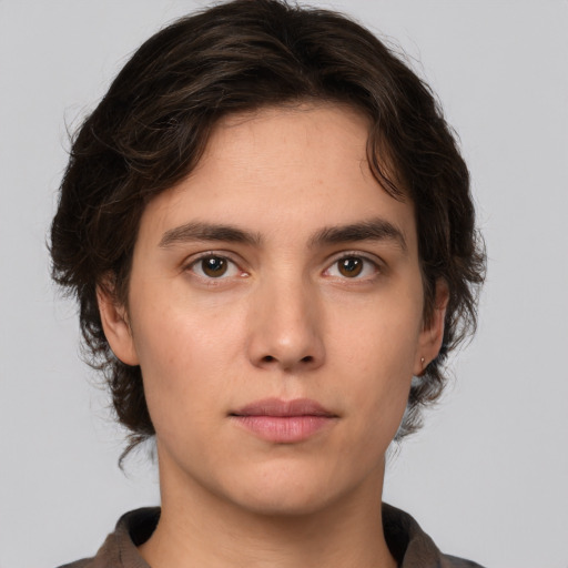Neutral white young-adult male with medium  brown hair and brown eyes