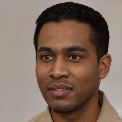 Neutral black young-adult male with short  black hair and brown eyes