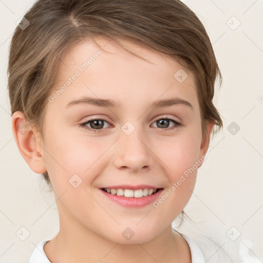 Joyful white child female with short  brown hair and brown eyes