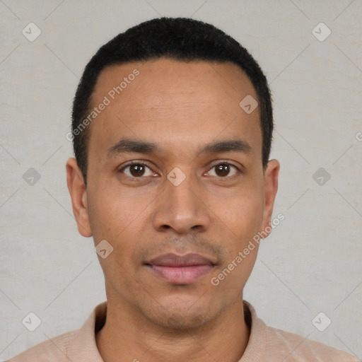 Joyful latino young-adult male with short  black hair and brown eyes