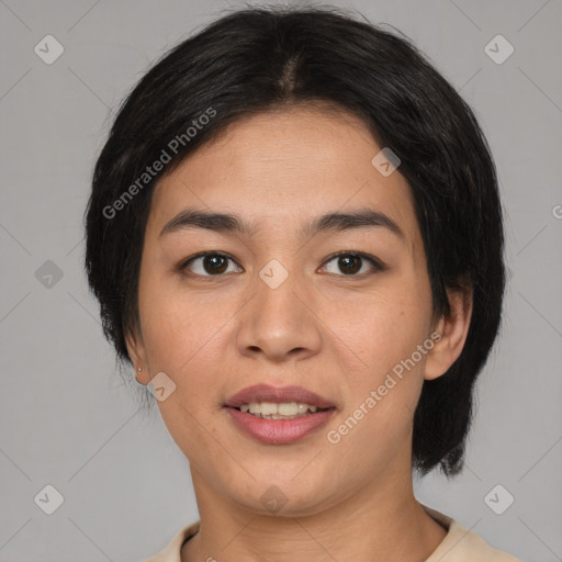 Joyful asian young-adult female with medium  brown hair and brown eyes