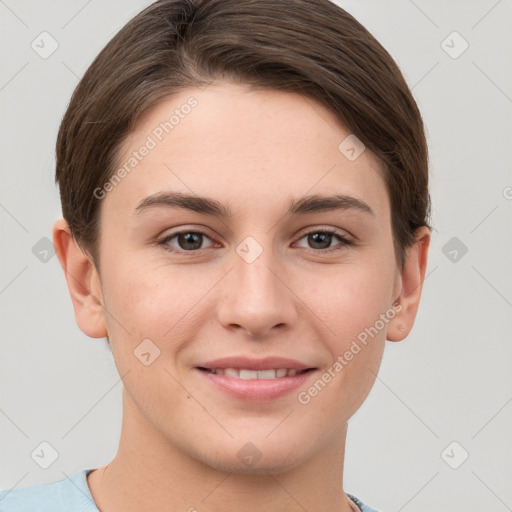 Joyful white young-adult female with short  brown hair and grey eyes