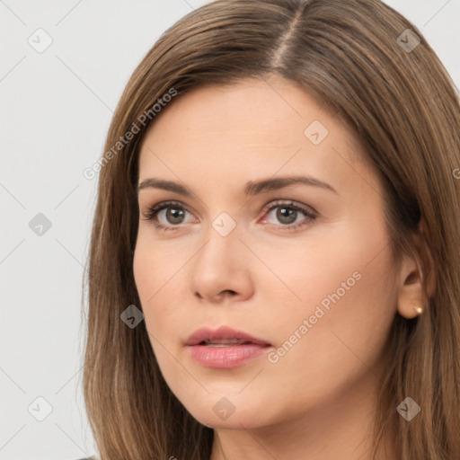 Neutral white young-adult female with long  brown hair and brown eyes