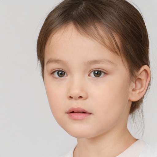 Neutral white child female with medium  brown hair and brown eyes