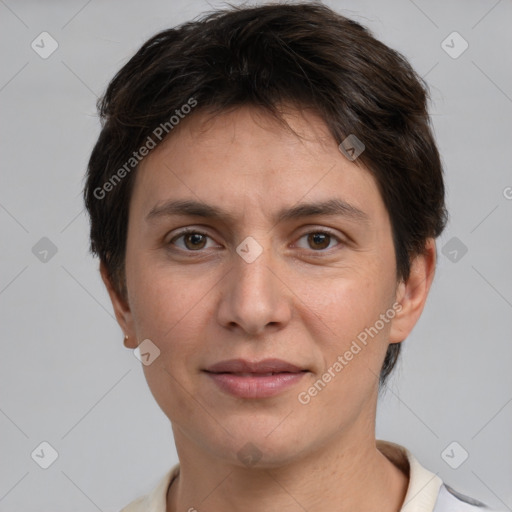 Joyful white adult female with short  brown hair and brown eyes