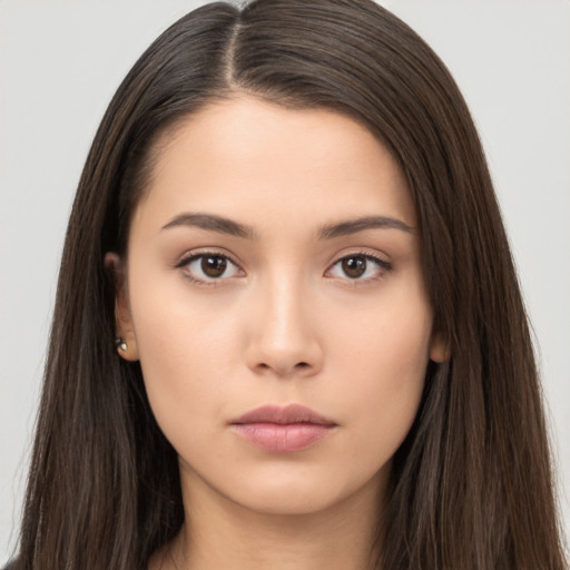 Neutral asian young-adult female with long  brown hair and brown eyes