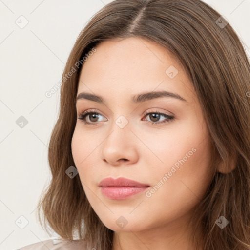 Neutral white young-adult female with long  brown hair and brown eyes