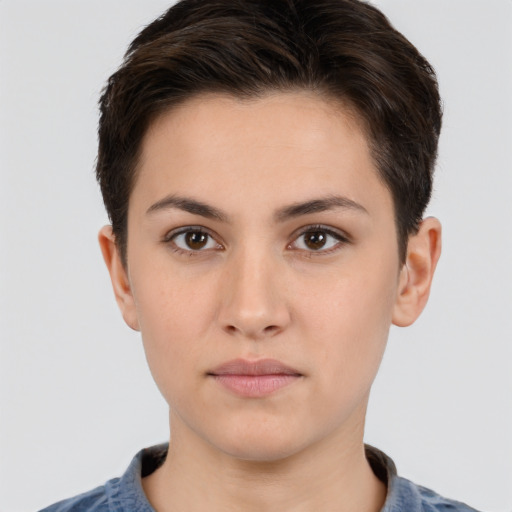 Neutral white young-adult female with short  brown hair and brown eyes