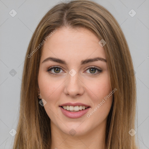 Joyful white young-adult female with long  brown hair and green eyes