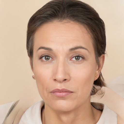 Neutral white adult female with short  brown hair and brown eyes