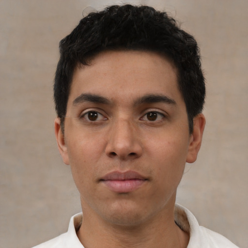 Neutral white young-adult male with short  black hair and brown eyes