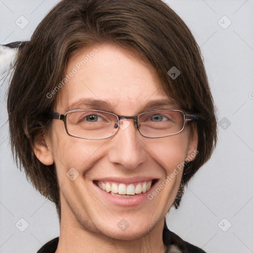 Joyful white adult female with short  brown hair and grey eyes