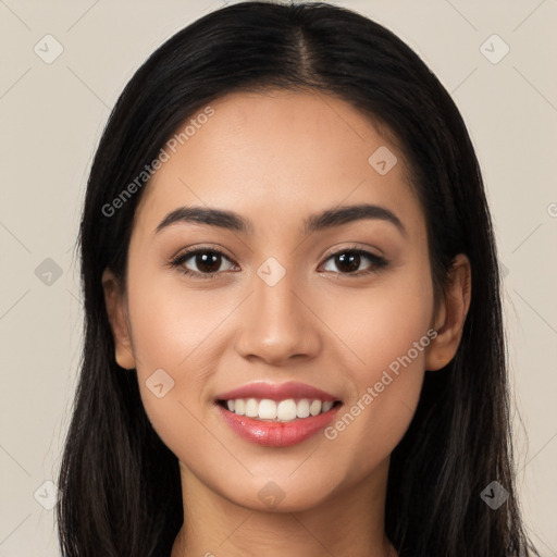 Joyful white young-adult female with long  black hair and brown eyes