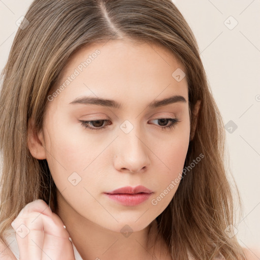 Neutral white young-adult female with long  brown hair and brown eyes