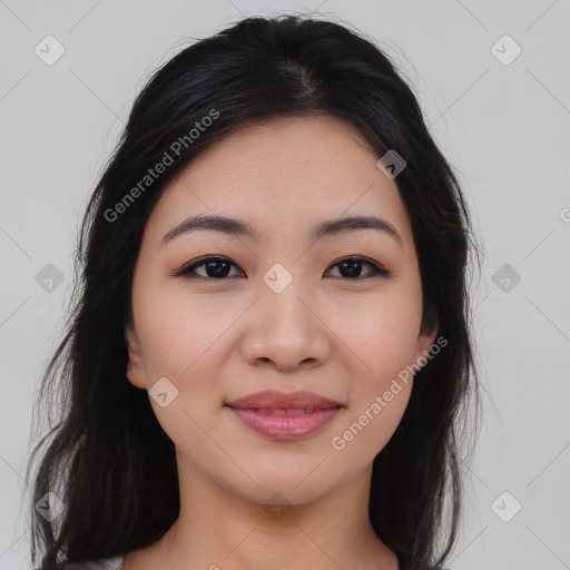 Joyful asian young-adult female with long  brown hair and brown eyes