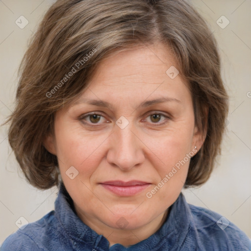 Joyful white adult female with medium  brown hair and blue eyes