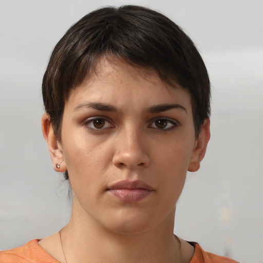 Neutral white young-adult female with short  brown hair and brown eyes