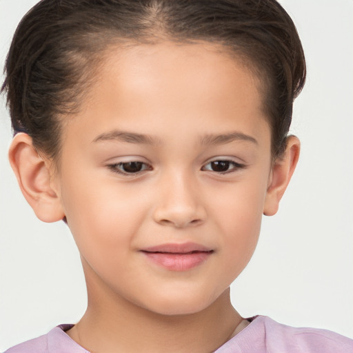 Joyful white child female with short  brown hair and brown eyes