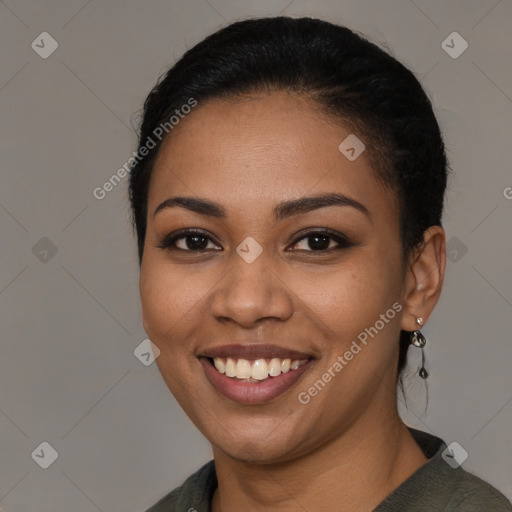 Joyful latino young-adult female with short  black hair and brown eyes