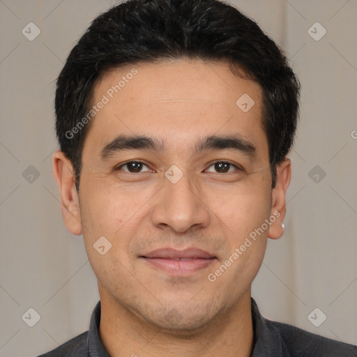 Joyful white young-adult male with short  black hair and brown eyes