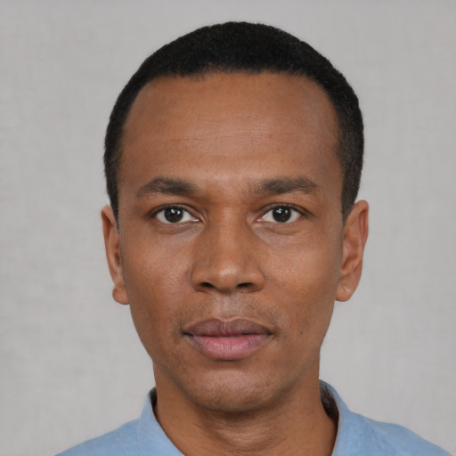 Neutral black young-adult male with short  black hair and brown eyes