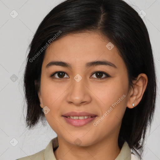 Joyful asian young-adult female with medium  brown hair and brown eyes