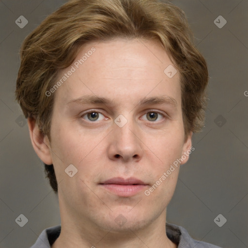 Joyful white adult male with short  brown hair and grey eyes