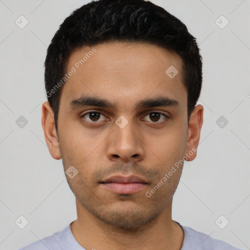 Neutral latino young-adult male with short  black hair and brown eyes