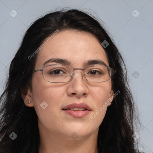 Joyful white adult female with long  brown hair and brown eyes