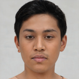 Neutral asian young-adult male with short  black hair and brown eyes