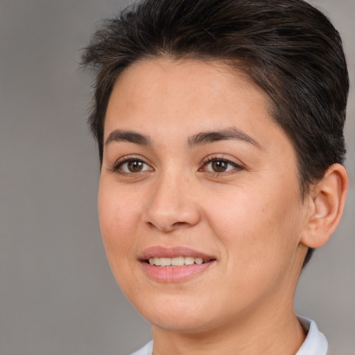 Joyful white young-adult female with medium  brown hair and brown eyes