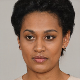 Neutral black young-adult female with short  black hair and brown eyes