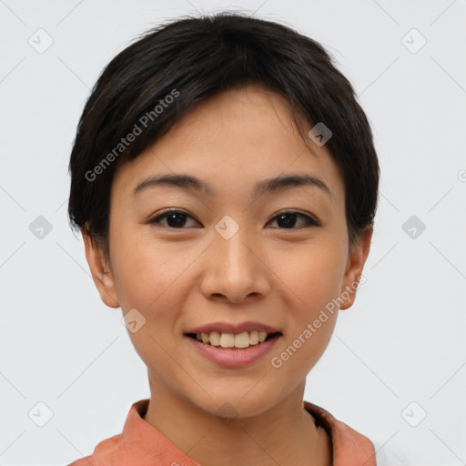 Joyful asian young-adult female with short  brown hair and brown eyes