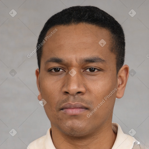 Neutral latino young-adult male with short  black hair and brown eyes