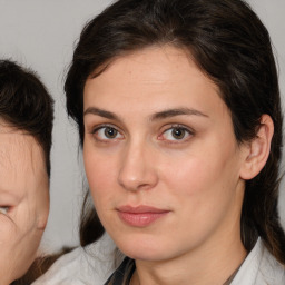 Neutral white young-adult female with medium  brown hair and brown eyes