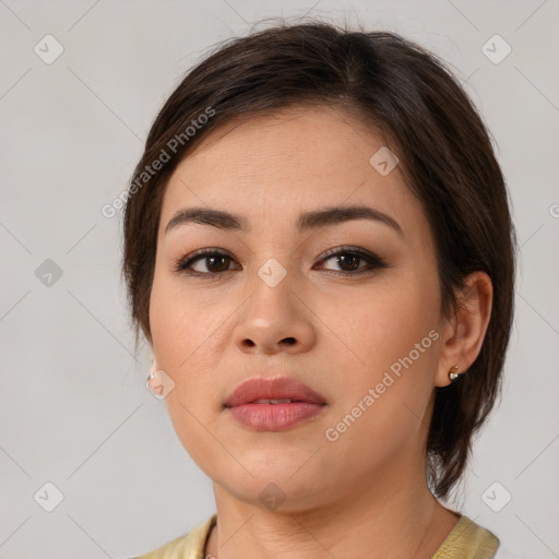 Neutral white young-adult female with medium  brown hair and brown eyes