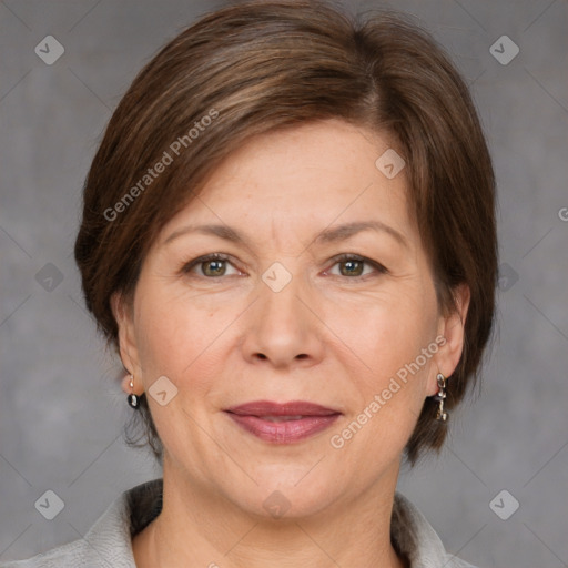 Joyful white adult female with medium  brown hair and grey eyes