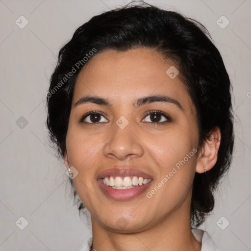 Joyful latino young-adult female with medium  black hair and brown eyes