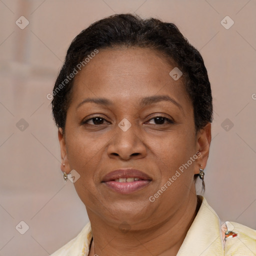 Joyful latino adult female with short  brown hair and brown eyes