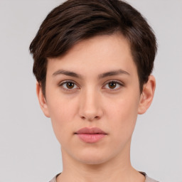 Neutral white young-adult female with short  brown hair and brown eyes