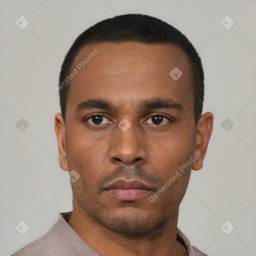 Neutral latino young-adult male with short  black hair and brown eyes