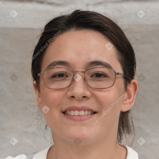 Joyful white adult female with medium  brown hair and brown eyes