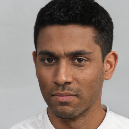 Neutral black young-adult male with short  black hair and brown eyes